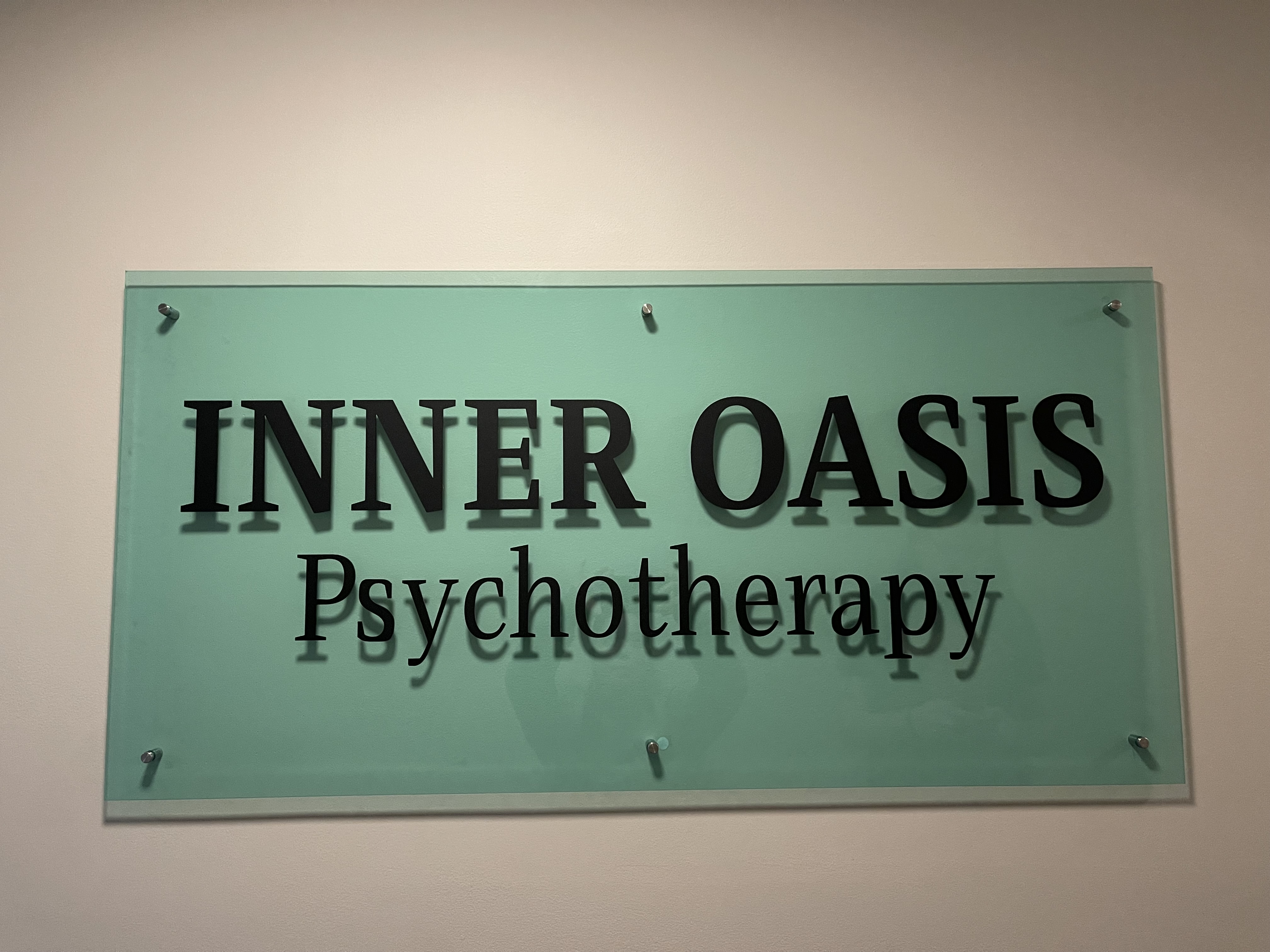 Sign that says: Inner Oasis Psychotherapy